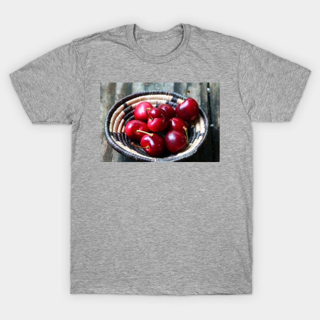 Red cherries in a basket. T-Shirt by ikshvaku